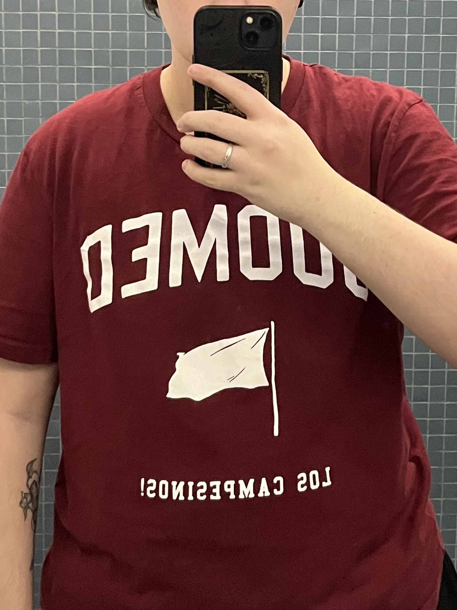 Trans man wearing a red shirt